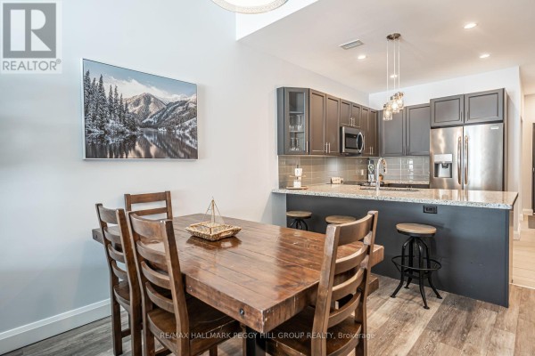 Living room - 503 - 80 Horseshoe Boulevard, Oro Medonte, ON L4M4Y8 Photo 5