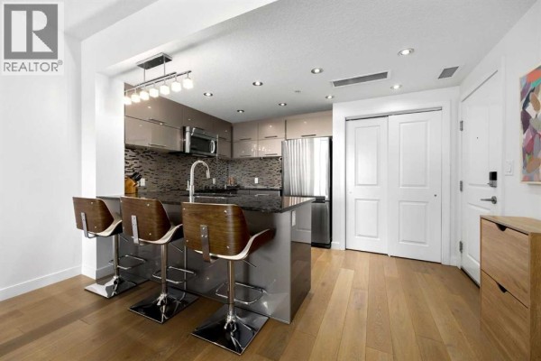 Living room - 504, 1110 3 Avenue Nw, Calgary, AB T2N4J3 Photo 5