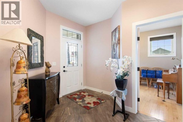 Laundry room - 504 Harrison Court, Crossfield, AB T0M0S0 Photo 5