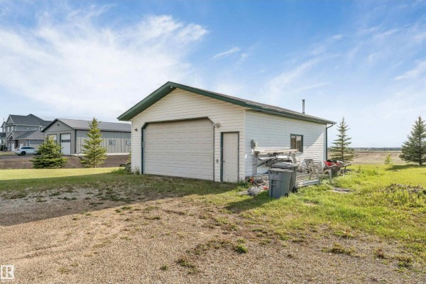 Family room - 50436 Rge Rd 240, Rural Leduc County, AB T4M0M6 Photo 4