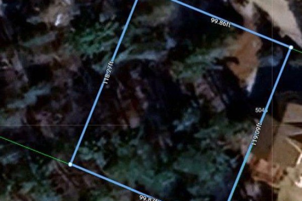 Aerial view of a property lot outlined with blue lines and measurements. - 5045 Opeongo Road, Ottawa