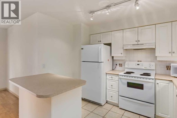 Primary Bedroom - 505, 650 10 Street Sw, Calgary, AB T2P5G4 Photo 5
