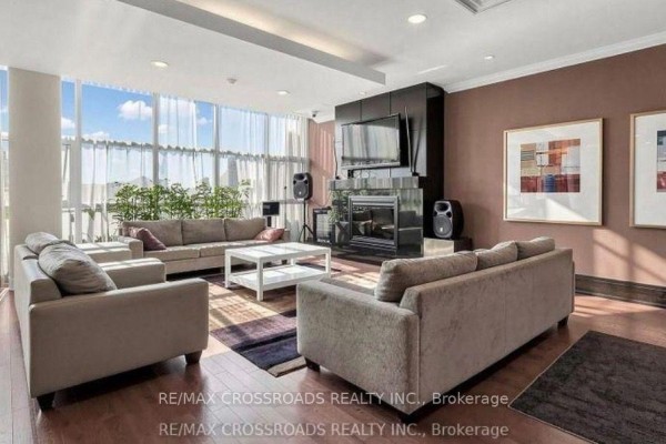 Communal amenity space with a long dining table, bar, kitchen, and pool table. - 505 - 21 Upper Duke Crescent, Markham