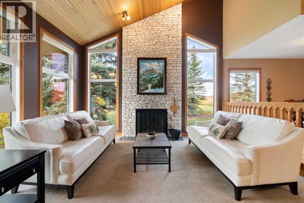 Living room - 505 Bearspaw Village Ridge Nw, Rural Rocky View County, AB T3L2P1 Photo 5