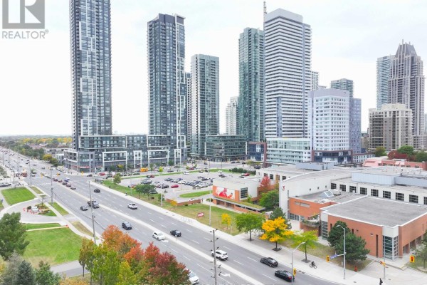 Aerial view of Mississauga cityscape with high-rise buildings, traffic, and trees. - 508 - 325 Webb Drive, Mississauga