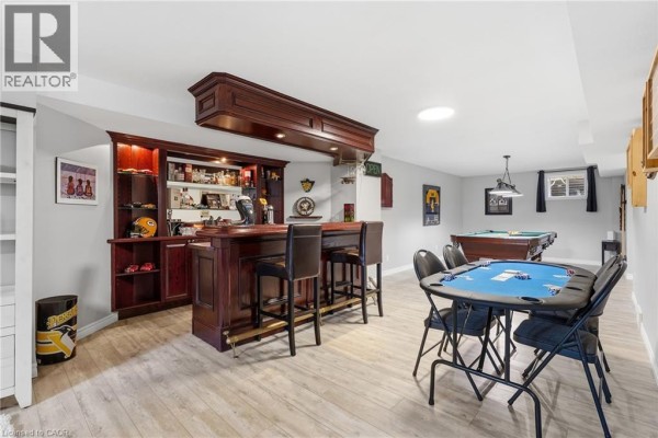 Bar, pool table, and poker table in finished basement - 51 Autumn Ridge Trail Kitchener