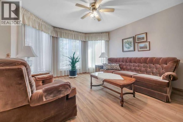 Family room - 51 Willow Springs Crescent, Sylvan Lake, AB T4S1G3 Photo 4