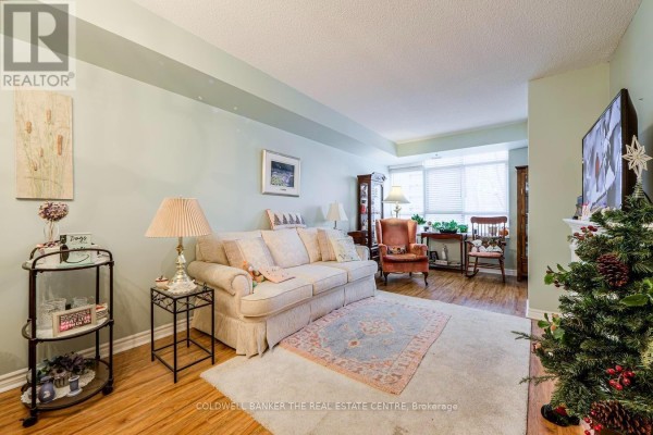 Spacious common area with seating, ping pong table, and natural light - 510 - 115 Bonis Avenue, Toronto