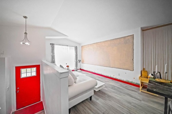 Dining space featuring a table set for six and a view into the kitchen - 513 Jamison Avenue, Winnipeg