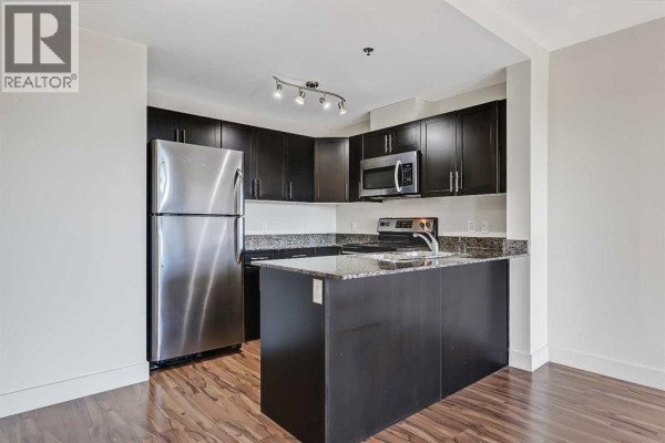 Primary Bedroom - 514, 955 Mcpherson Road Ne, Calgary, AB T2E6V3 Photo 2