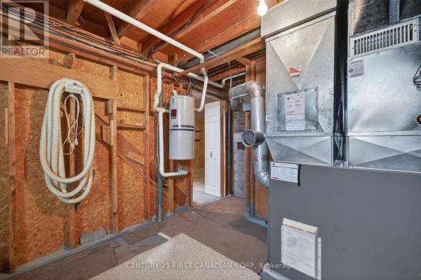 Furnace and water heater in unfinished basement - 5147 Egremont Drive Middlesex Centre