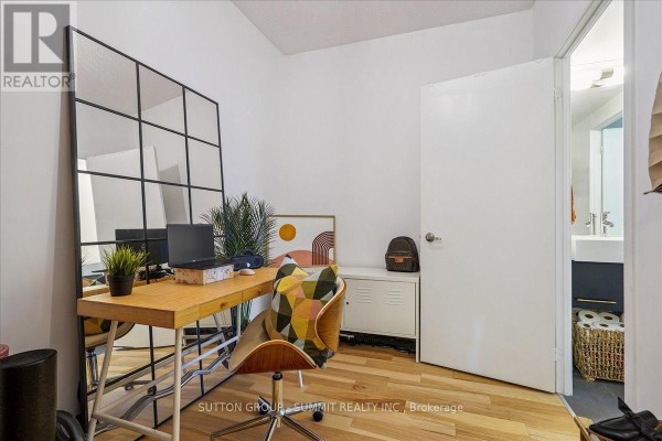 Home office with desk, laptop, chair, and mirror - 515 - 38 Dan Leckie Way Toronto