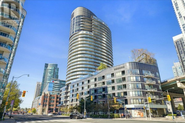 Modern condo building with balconies & glass facade - 515 - 38 Dan Leckie Way Toronto