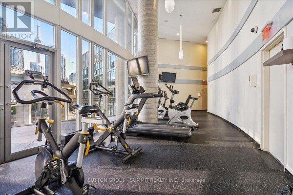 Gym with treadmill, stationary bikes, and city views - 515 - 38 Dan Leckie Way Toronto