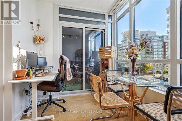 View of waterfront buildings and Lake Ontario from a balcony. - 515 - 38 Dan Leckie Way, Toronto