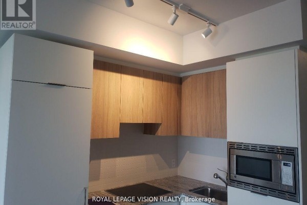 Kitchen - 515 - 50 O'neill Road, Toronto, ON M3C0R1 Photo 3