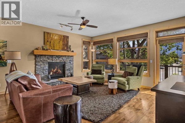 Living room - 516 8th Avenue, Canmore, AB T1W2E3 Photo 4