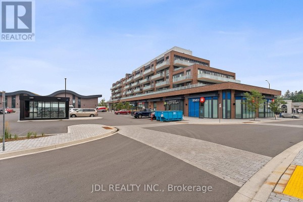 Primary Bedroom - 519 - 215 Lakeshore Road W, Mississauga, ON L5H0A7 Photo 4
