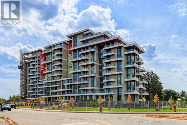 Modern multi-story apartment building with balconies and glass facade. - 519 - 399 Royal Orchard Boulevard, Markham