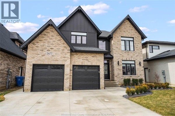 Bright foyer with double doors, tile flooring, and natural light - 5197 Rafael, Tecumseh