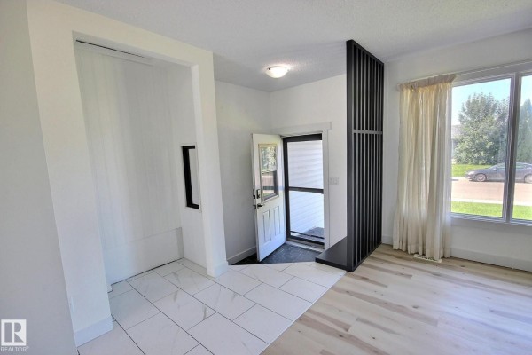 Family room - 5207 46 St, Beaumont, AB T4X1H9 Photo 4