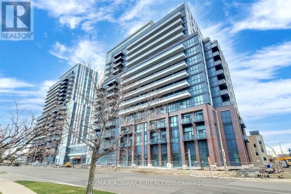 Exterior view of a tall, modern apartment building with many balconies. - 521 - 10 Honeycrisp Crescent, Vaughan