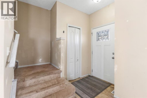Living room - 523 Strathaven Mews, Strathmore, AB T1P1P5 Photo 2