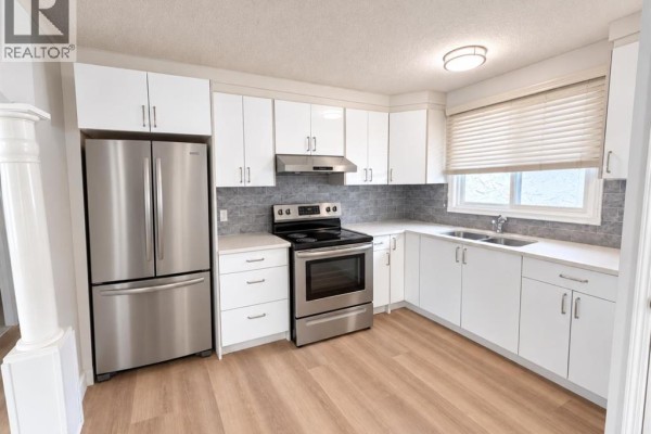 Living room - 5230 Whitestone Road Ne, Calgary, AB T1Y1T6 Photo 2