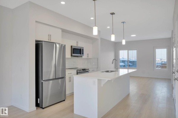 Kitchen - 5239 - 5245 21a Av Sw Sw, Edmonton, AB T6X1X5 Photo 3