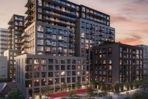 Architectural rendering of a multi-story modern apartment building at sunset. - 526 - 543 Richmond Street W, Toronto