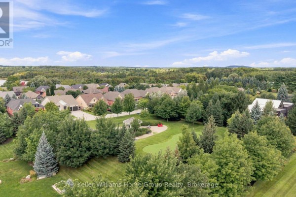 Suburban homes with golf putting green, gazebo & forested landscape - 53 - 145 Aberfoyle Mill Crescent Puslinch