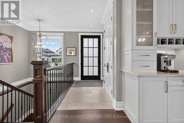 Angular view of a modern two-story house with a symmetrical design and dark grey roof. - 53 Wayside Lane, Southwold