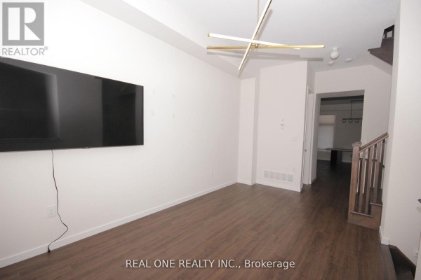Family room - 53 Wuhan Lane, Markham, ON L6E0V4 Photo 3