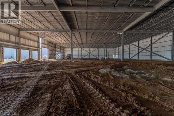 Long view of the extensive steel framework for a commercial building under construction. - 539 Paris Road Unit# 2, Paris