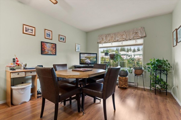 Exterior view of townhouse with brick accents and landscaped front - 54 3110 Trafalgar Street, Abbotsford