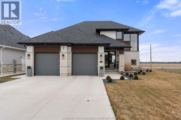 Modern home with double garage and stone accents - 54 Dundee Drive West Chatham