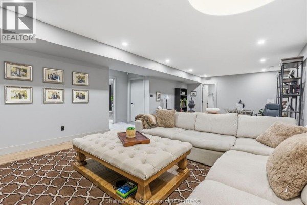 Large sectional sofa, ottoman coffee table, gallery wall - 54 Dundee Drive West Chatham