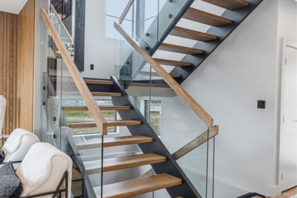 Modern floating staircase with glass railings & wood treads - 54 Dundee Drive West Chatham