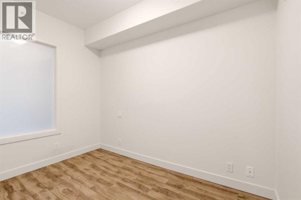 Eat in kitchen - 544, 222 Riverfront Avenue Sw, Calgary, AB T2P0X2 Photo 5