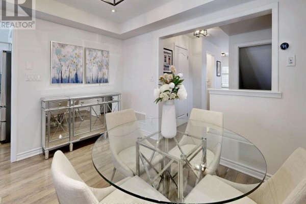 Glass dining table with upholstered chairs and mirrored buffet - 55 Stocks Lane Aurora