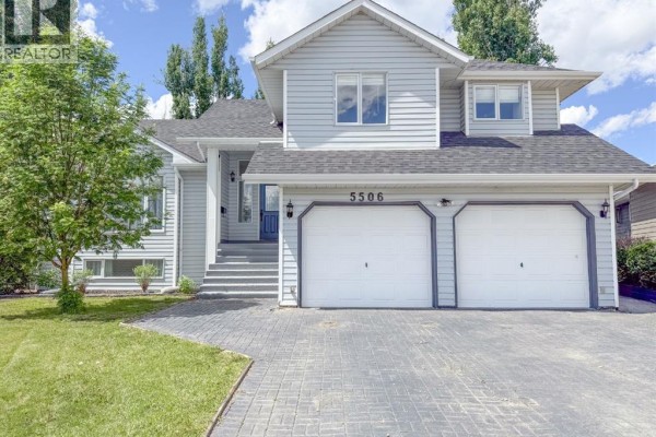 Living room - 5506 63a Street Close, Ponoka, AB T4J1K9 Photo 2