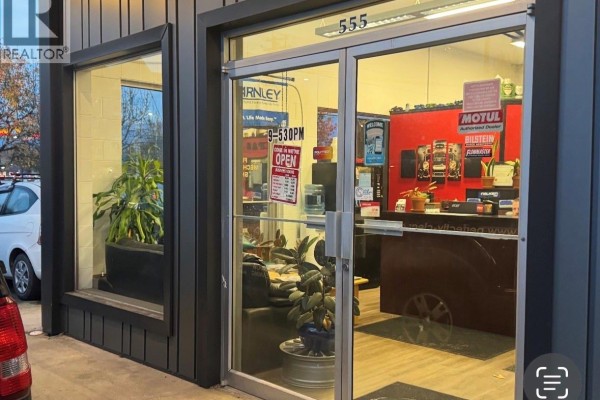 Close-up of entrance with glass doors, signage, and interior view - 555 Coronation Ave, Duncan