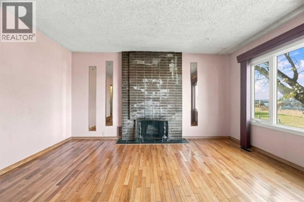 Living room - 556 Lysander Drive Se, Calgary, AB T2C1L7 Photo 4