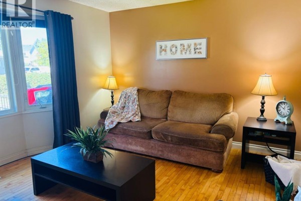 Living room - 56 Aberfoyle Place Ne, Calgary, AB T2A6W7 Photo 2
