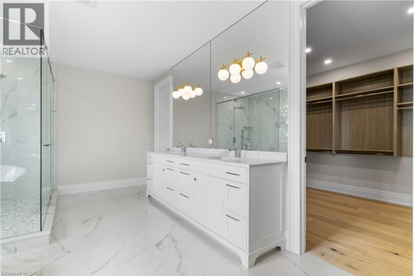 Double vanity, walk-in shower, soaking tub, and closet - 56 Pioneer Ridge Drive Kitchener