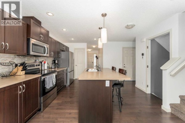 Primary Bedroom - 562 River Heights Crescent, Cochrane, AB T4C0T8 Photo 5