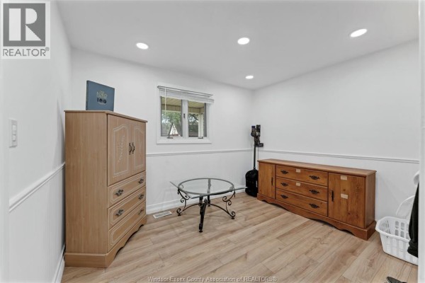 Tall wooden cabinet, glass coffee table, and wooden dresser - 567 Edinborough Windsor
