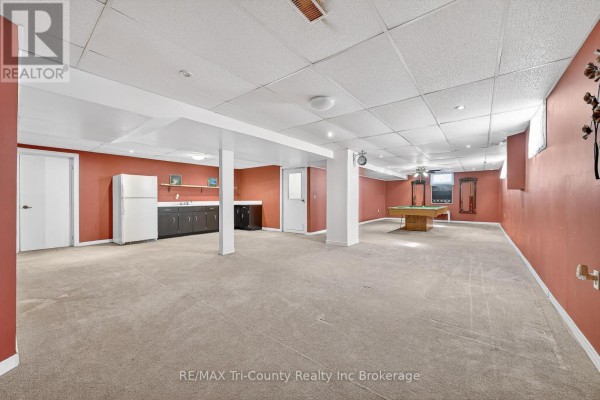 Finished basement with wet bar, refrigerator, and pool table - 568 7th Concession Enr Road Norfolk