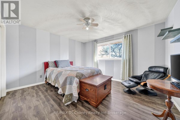 Bedroom with queen bed, recliner, chest, TV - 568 7th Concession Enr Road Norfolk
