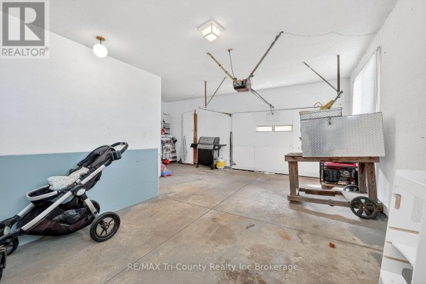 Garage with grill, generator, and stroller - 568 7th Concession Enr Road Norfolk